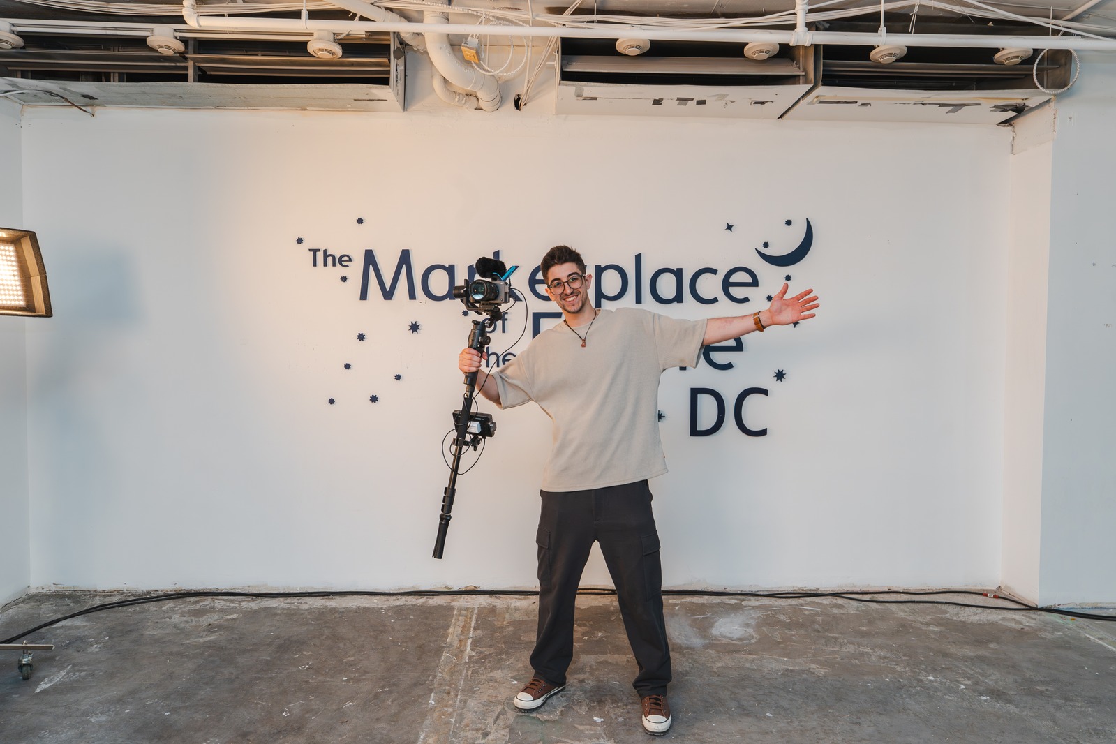 Heni Abid filming at The Marketplace of the Future in DC